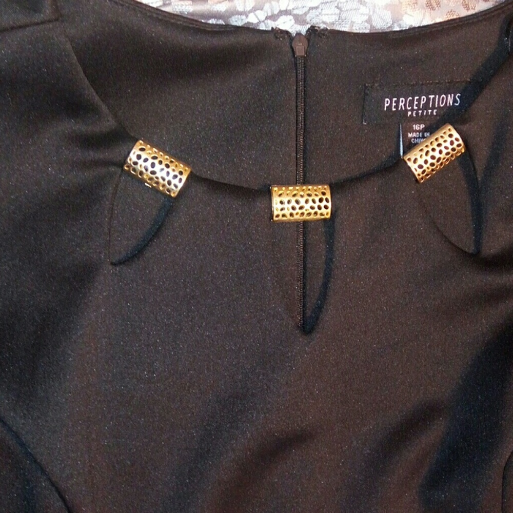 Black dress with gold hoops along neckline